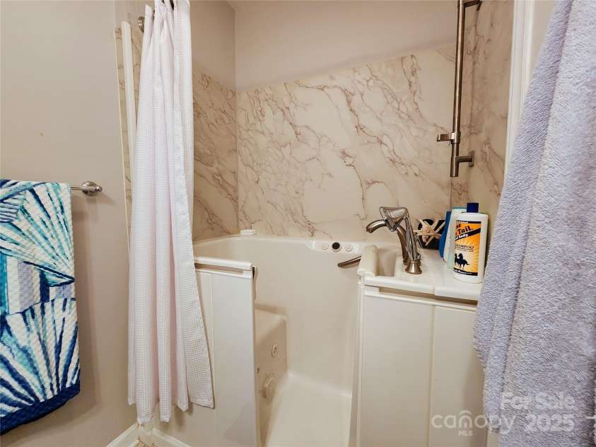 100 Wentworth Drive, Mocksville, NC 27028.  MLS# CAR4296498, YatesRealty ID 34495. Hall bath