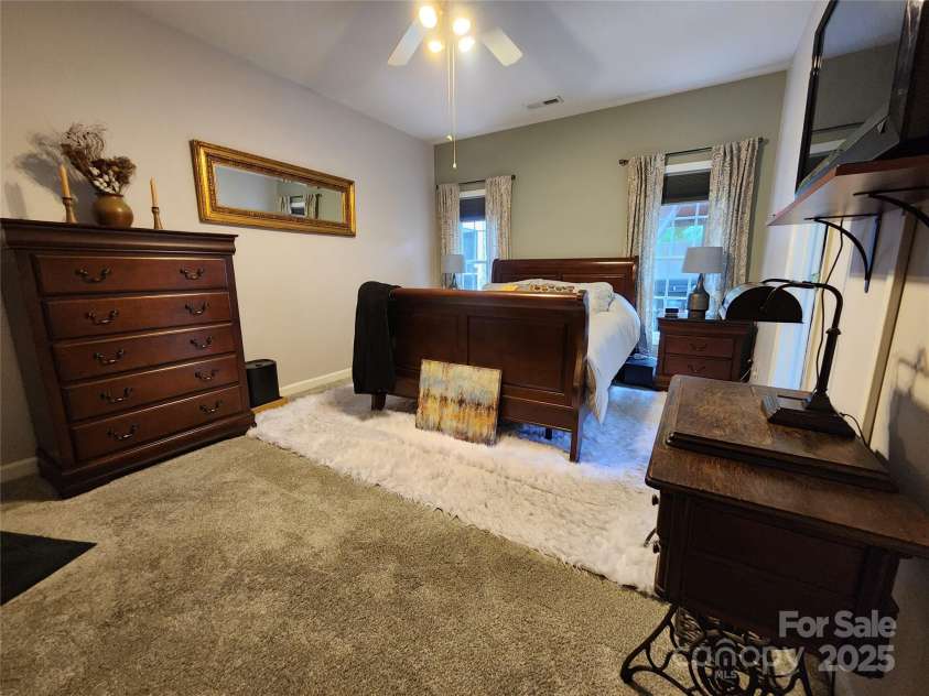 100 Wentworth Drive, Mocksville, NC 27028.  MLS# CAR4296498, YatesRealty ID 34495. Primary Bedroom