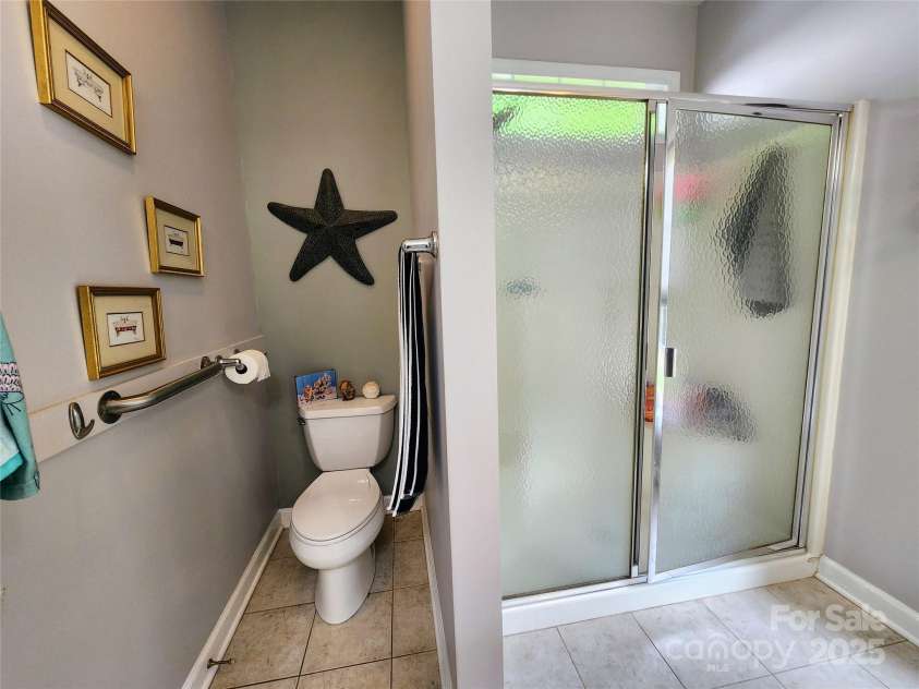 100 Wentworth Drive, Mocksville, NC 27028.  MLS# CAR4296498, YatesRealty ID 34495. Primary en-suite bathroom