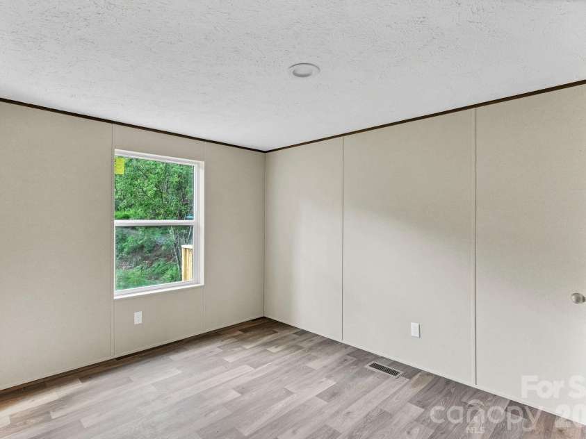 49 Spivey Mountain Road, Asheville, NC 28806.  MLS# CAR4398728, YatesRealty ID 34495. 