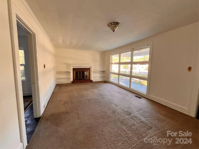 704 Mcadenville Road, Lowell, NC 28098.  MLS# CAR4190919, YatesRealty ID 3450. 