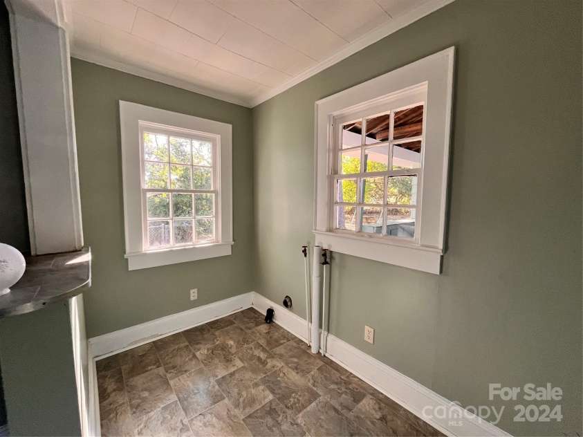 704 Mcadenville Road, Lowell, NC 28098.  MLS# CAR4190919, YatesRealty ID 3450. 