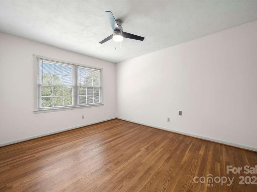 205 Gaston Avenue, Bessemer City, NC 28016.  MLS# CAR4296266, YatesRealty ID 34504. Bedroom 2 with gorgeous hardwood flooring