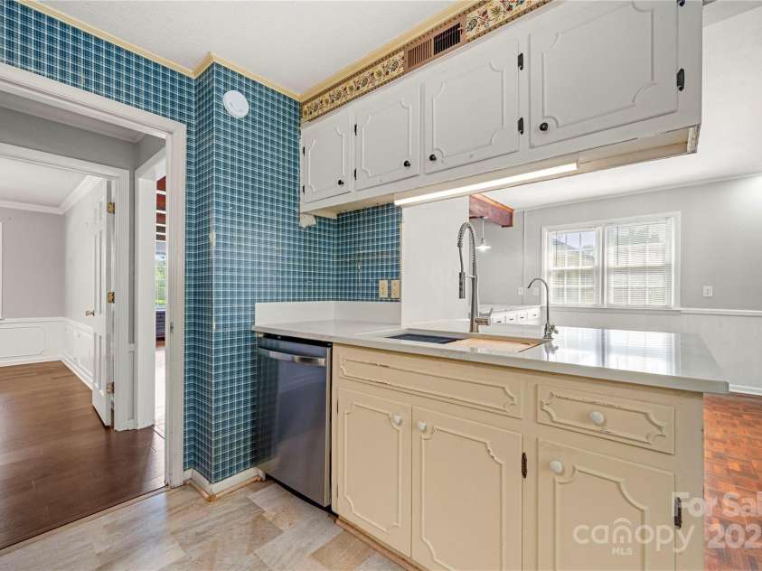 205 Gaston Avenue, Bessemer City, NC 28016.  MLS# CAR4296266, YatesRealty ID 34504. Kitchen has new quartz countertops