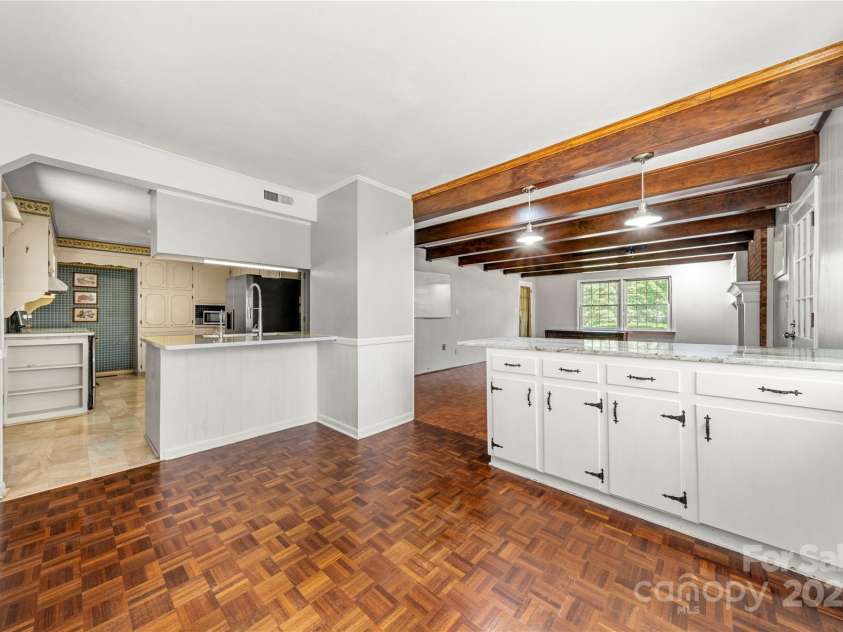 205 Gaston Avenue, Bessemer City, NC 28016.  MLS# CAR4296266, YatesRealty ID 34504. Large breakfast room with countertop and cabinets