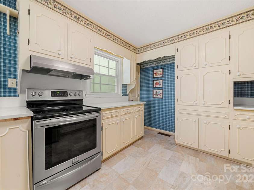 205 Gaston Avenue, Bessemer City, NC 28016.  MLS# CAR4296266, YatesRealty ID 34504. Newer appliances in kitchen