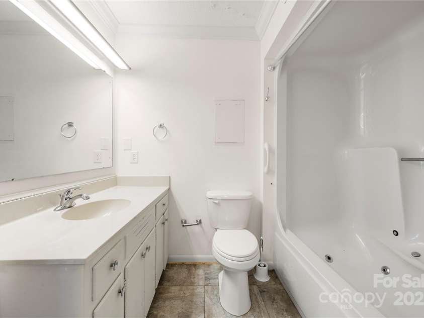 205 Gaston Avenue, Bessemer City, NC 28016.  MLS# CAR4296266, YatesRealty ID 34504. Primary ensuite with dual vanities