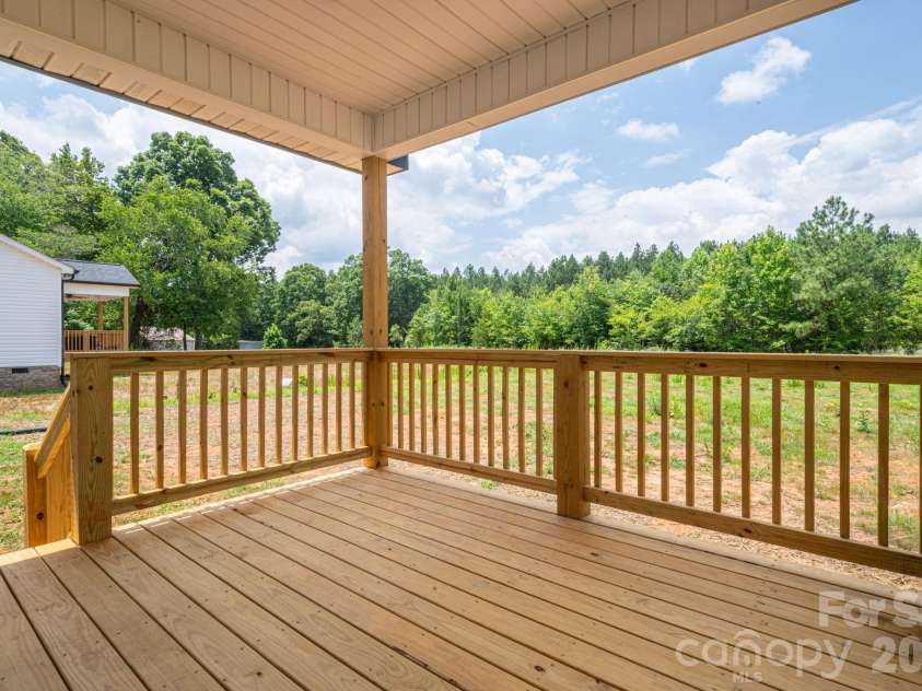 2474 Shoal Road, Crouse, NC 28033.  MLS# CAR4398463, YatesRealty ID 34507. Rear Deck & Yard