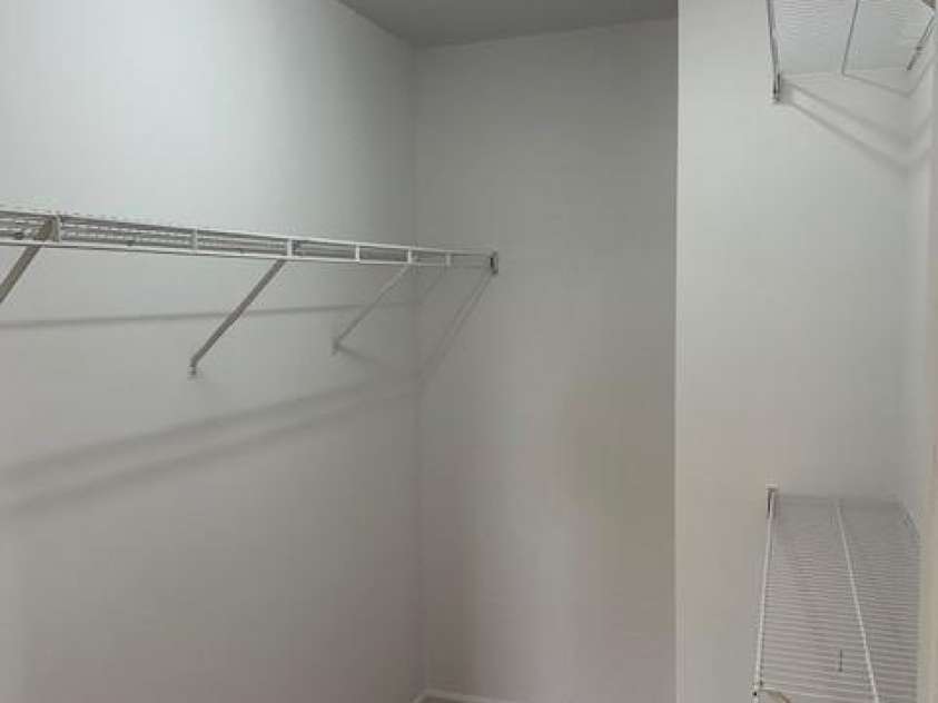 2113 Ballingarry Drive, Statesville, NC 28625.  MLS# CAR4277478, YatesRealty ID 34513. One of two walk-in closets in the master