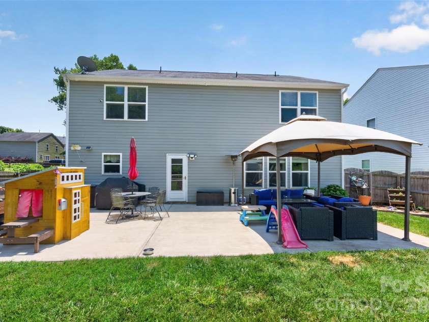 1200 Catawba Run, Lowell, NC 28098.  MLS# CAR4392613, YatesRealty ID 34515. Back Yard