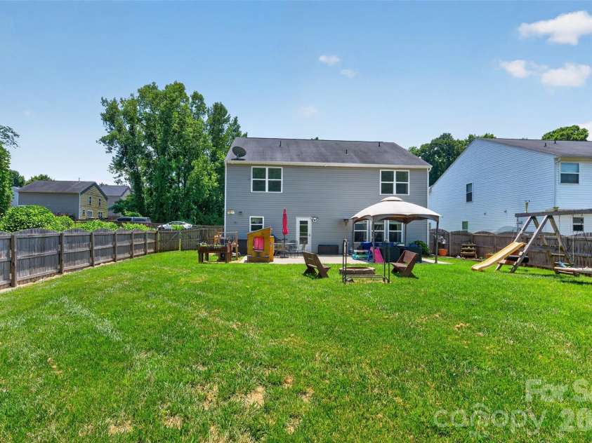 1200 Catawba Run, Lowell, NC 28098.  MLS# CAR4392613, YatesRealty ID 34515. Back Yard