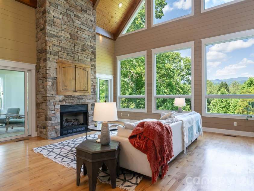 33 Bridle Path Drive, Barnardsville, NC 28709.  MLS# CAR4378002, YatesRealty ID 34516. Architecturally designed to maximize natural light and mountain views, featuring soaring ceilings, dramatic windows, and skylights.