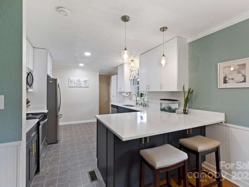 242 Pattys Chapel Road, Fletcher, NC 28732.  MLS# CAR4264130, YatesRealty ID 34519. Fully updated kitchen