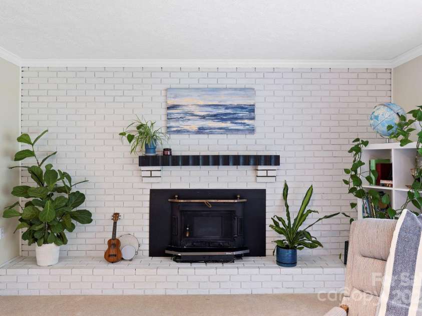 242 Pattys Chapel Road, Fletcher, NC 28732.  MLS# CAR4264130, YatesRealty ID 34519. With beautiful fireplace