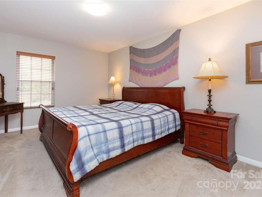 210 State Street, Asheville, NC 28806.  MLS# CAR4218309, YatesRealty ID 3452. Large primary bedroom.