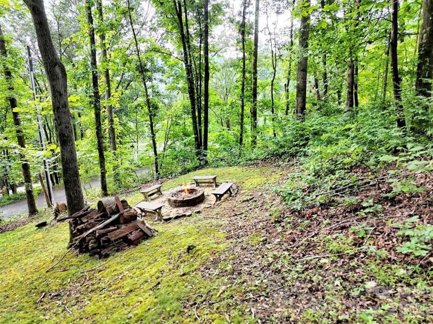 346 Wendy Way, Clyde, NC 28721.  MLS# CAR4289495, YatesRealty ID 3452. Firepit