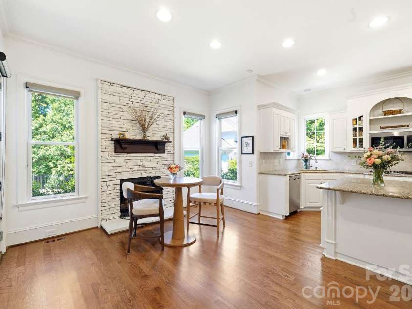11120 Mcclure Manor Drive, Charlotte, NC 28277.  MLS# CAR4398622, YatesRealty ID 34520. Breakfast Area with stone fireplace
