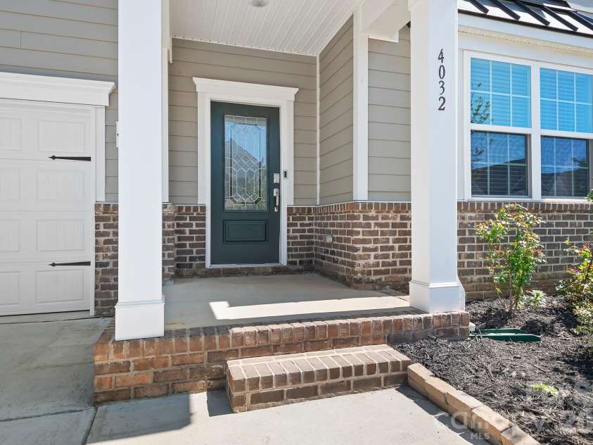 4032 Whipcord Drive, Waxhaw, NC 28173.  MLS# CAR4369759, YatesRealty ID 34523. Front porch