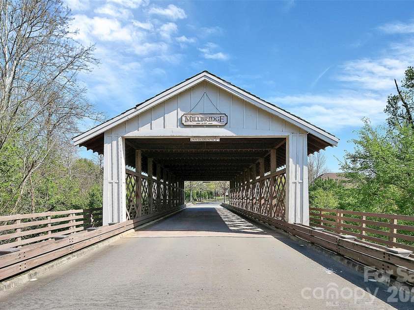 4032 Whipcord Drive, Waxhaw, NC 28173.  MLS# CAR4369759, YatesRealty ID 34523. The iconic Millbridge Bridge!