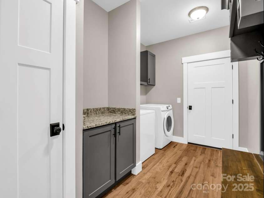 38 Scenic View Drive, Hendersonville, NC 28792.  MLS# CAR4288611, YatesRealty ID 34530. Ante Room with Laundry and Storage, leading to attached garage