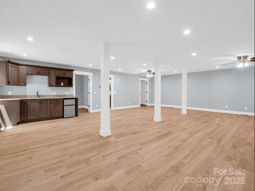 38 Scenic View Drive, Hendersonville, NC 28792.  MLS# CAR4288611, YatesRealty ID 34530. Lower Level Great Room 