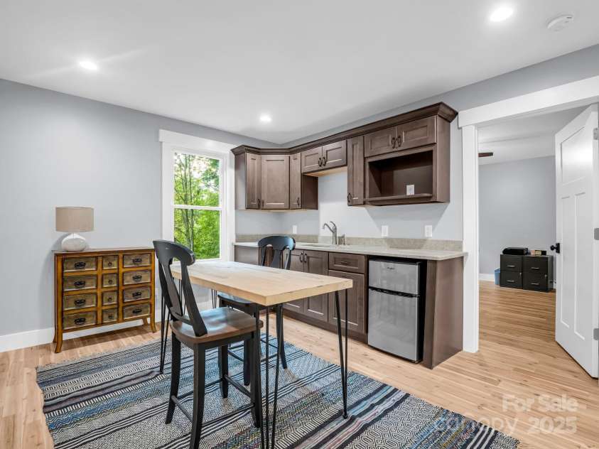 38 Scenic View Drive, Hendersonville, NC 28792.  MLS# CAR4288611, YatesRealty ID 34530. Lower Level Kitchenette (Previously staged, flooring replaced)