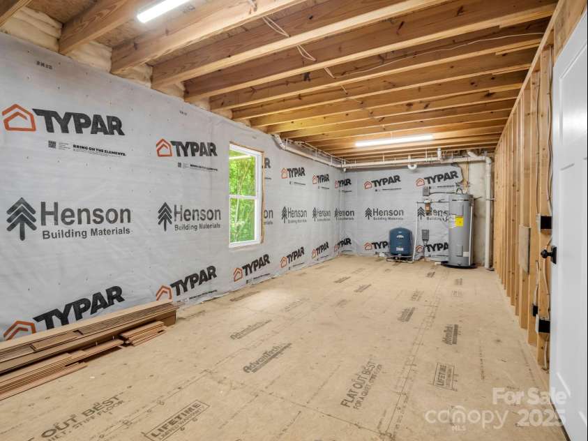 38 Scenic View Drive, Hendersonville, NC 28792.  MLS# CAR4288611, YatesRealty ID 34530. Unfinished storage room