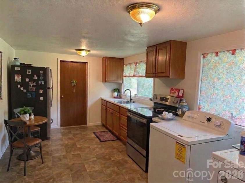 304 Main Avenue, Hildebran, NC 28637.  MLS# CAR4398663, YatesRealty ID 34539. Bistro table added virtually.
