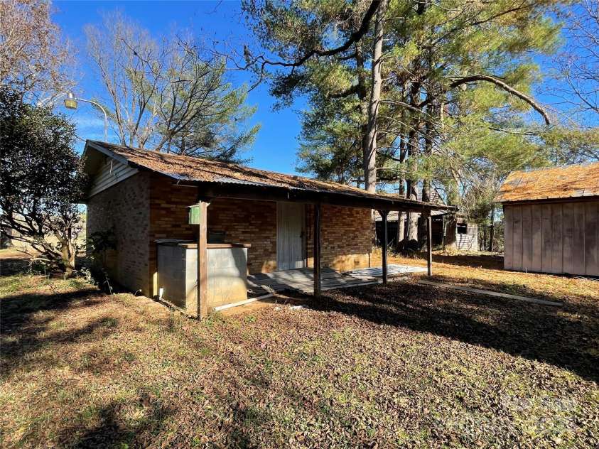8725 Bringle Ferry Road, Salisbury, NC 28146.  MLS# CAR4218468, YatesRealty ID 3454. Back of brick garage has covered patio area.