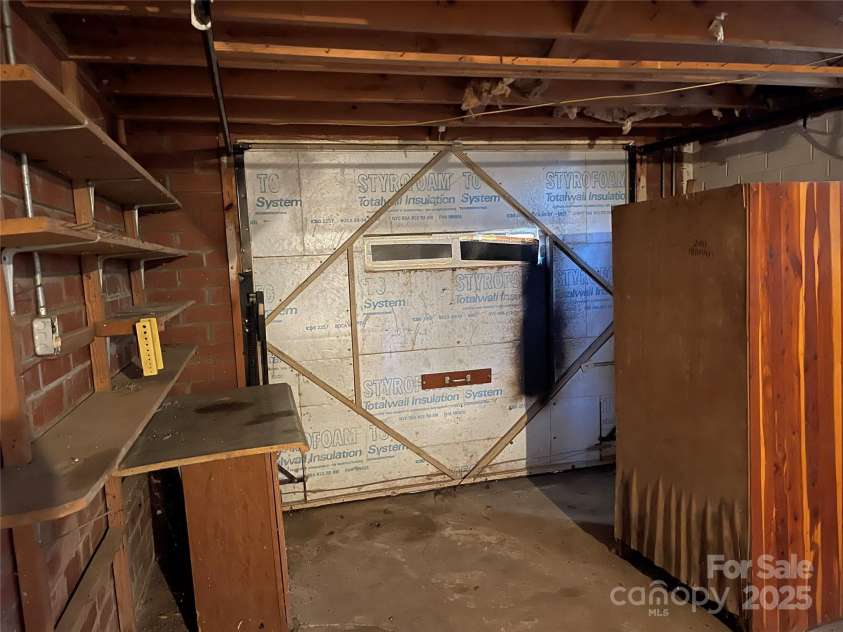 8725 Bringle Ferry Road, Salisbury, NC 28146.  MLS# CAR4218468, YatesRealty ID 3454. Garage door at shop area