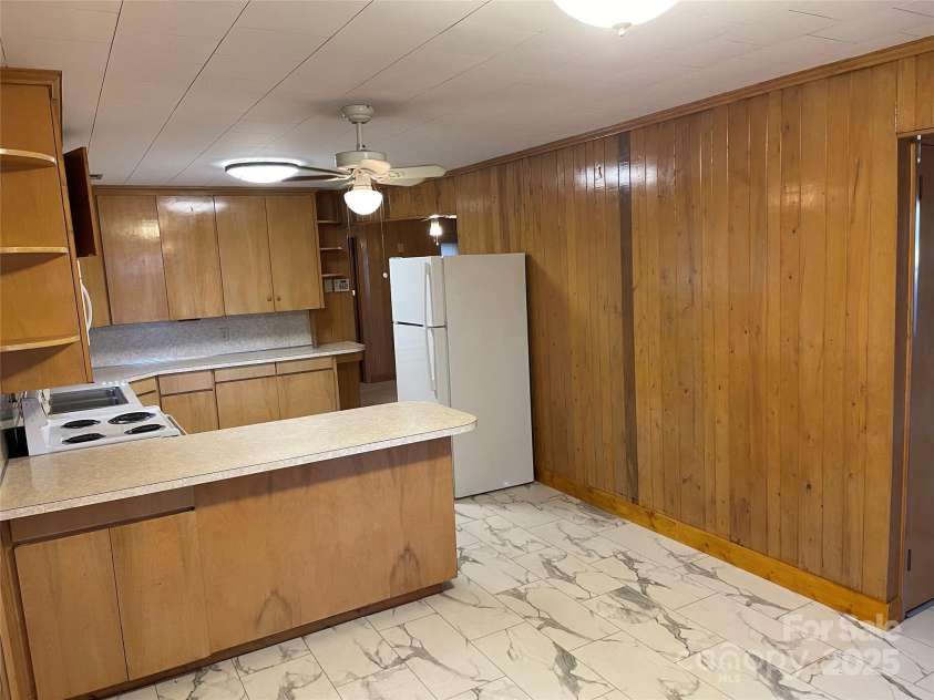 8725 Bringle Ferry Road, Salisbury, NC 28146.  MLS# CAR4218468, YatesRealty ID 3454. Kitchen viewed from dining room 