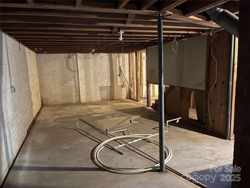 8725 Bringle Ferry Road, Salisbury, NC 28146.  MLS# CAR4218468, YatesRealty ID 3454. Open area in basement
