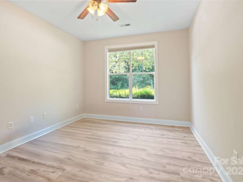 11 Town Circle, Flat Rock, NC 28731.  MLS# CAR4285794, YatesRealty ID 34545. Front bedroom