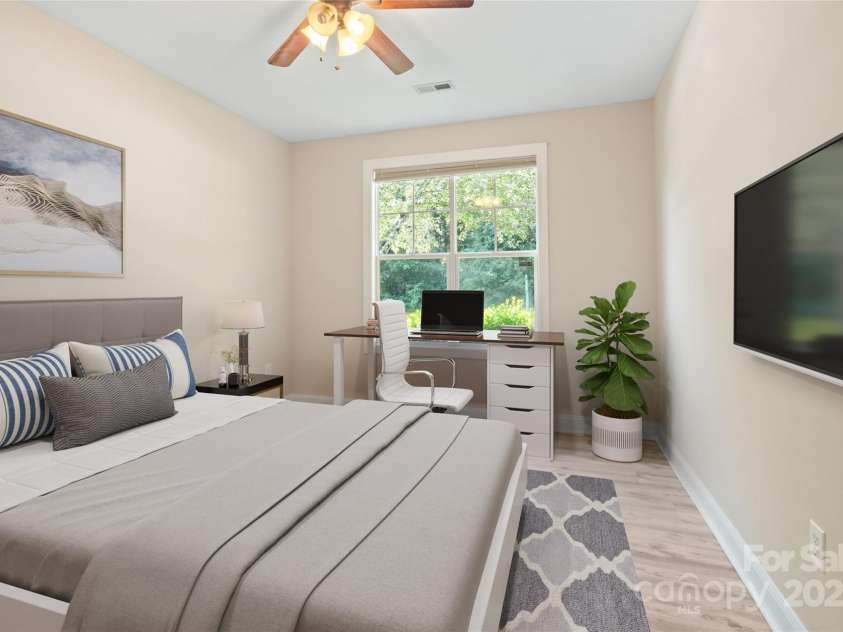 11 Town Circle, Flat Rock, NC 28731.  MLS# CAR4285794, YatesRealty ID 34545. Front bedroom *Virtually staged*