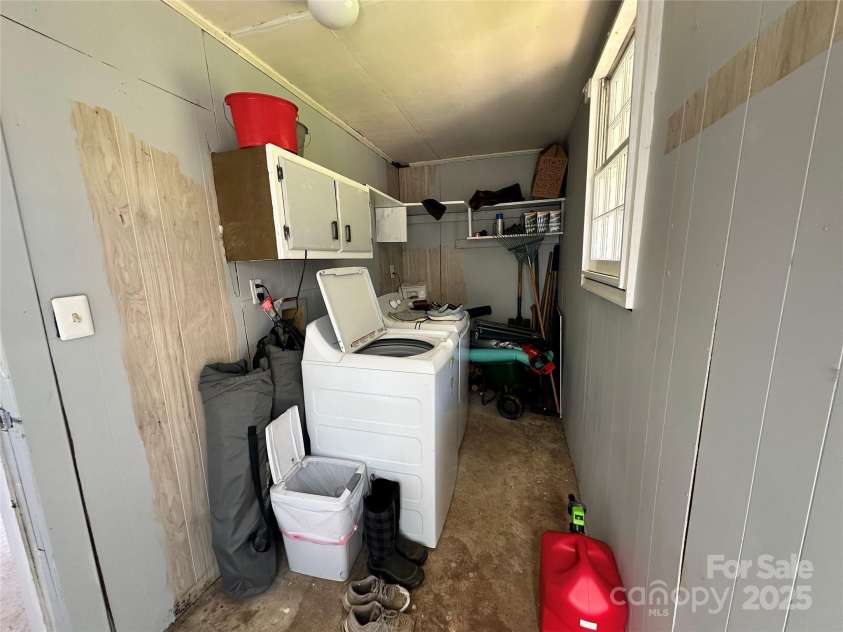 2309 Briarwood Street, Lenoir, NC 28645.  MLS# CAR4292016, YatesRealty ID 34548. Laundry in carport storage room
