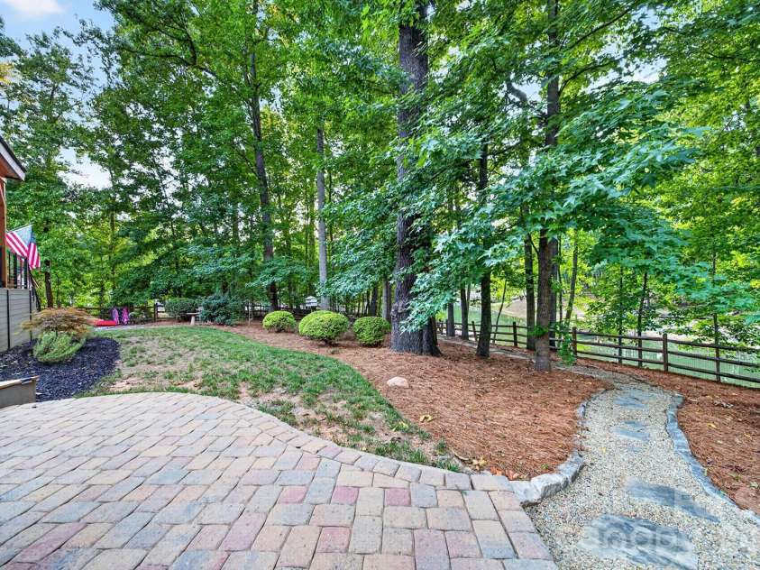 134 Waterford Drive, Mooresville, NC 28117.  MLS# CAR4389381, YatesRealty ID 34552. Pathway from your backyard to the lake 