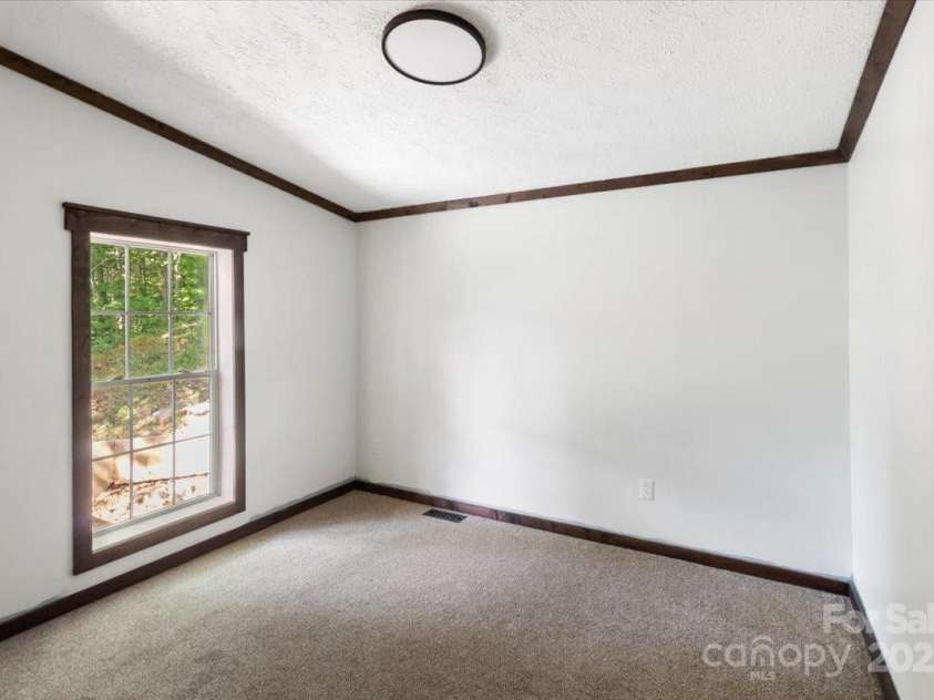 24 Libby Drive, Weaverville, NC 28787.  MLS# CAR4295450, YatesRealty ID 34553. 