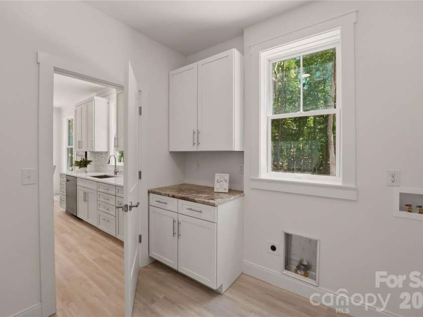 1701 Beechwood Lane, Monroe, NC 28112.  MLS# CAR4397385, YatesRealty ID 34555. Laundry Room