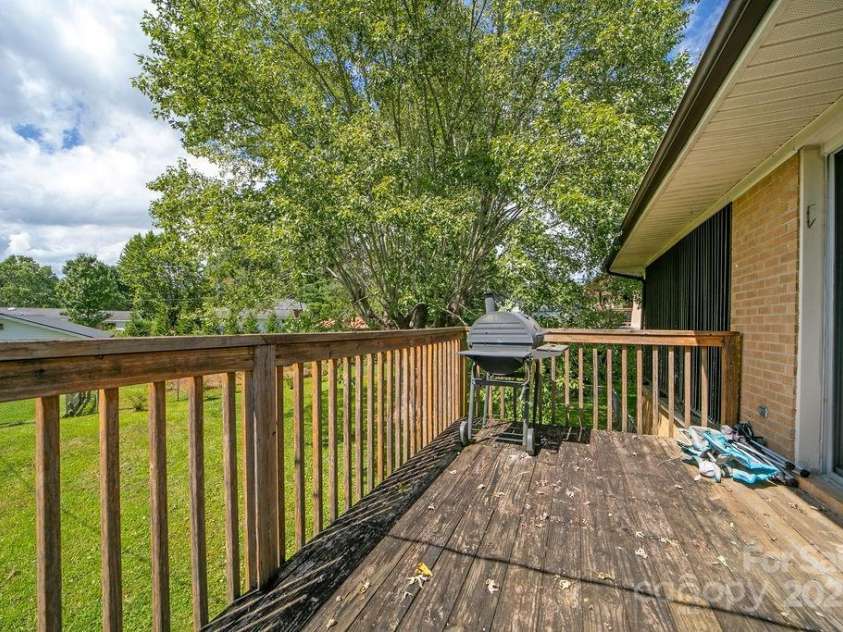 546 Country Club Road, Brevard, NC 28712.  MLS# CAR4295628, YatesRealty ID 34556. Large Rear Deck