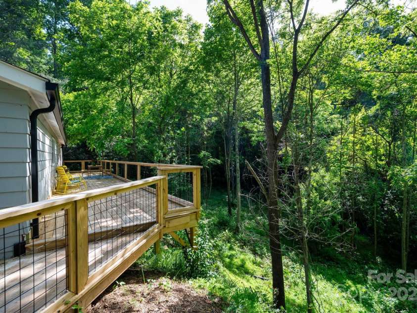 15 Yvonne Lane, Asheville, NC 28803.  MLS# CAR4198870, YatesRealty ID 3456. Back Deck Overlooks Woods