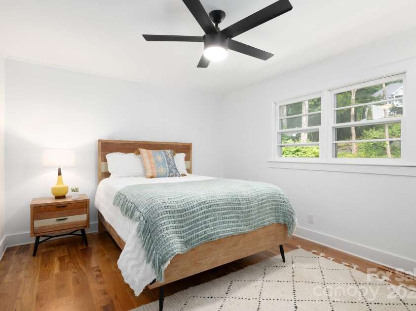 15 Yvonne Lane, Asheville, NC 28803.  MLS# CAR4198870, YatesRealty ID 3456. Bedroom with Modern Ceiling Fan