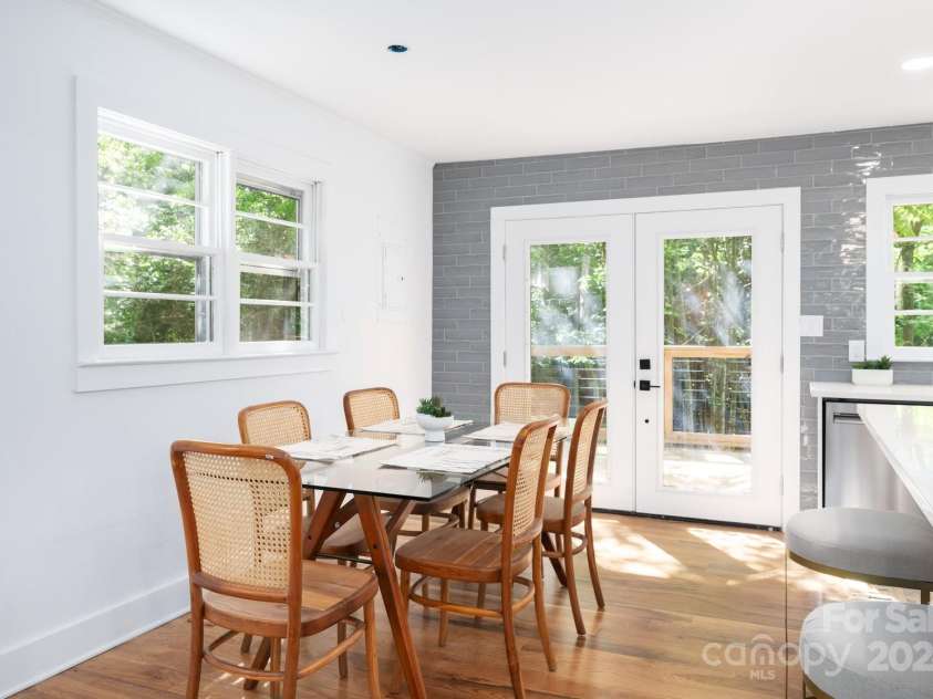15 Yvonne Lane, Asheville, NC 28803.  MLS# CAR4198870, YatesRealty ID 3456. Dining Area Off of Kitchen with Back Deck Access
