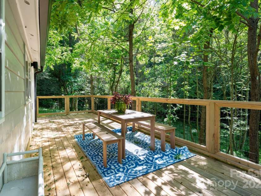 15 Yvonne Lane, Asheville, NC 28803.  MLS# CAR4198870, YatesRealty ID 3456. Enjoy the Tranquil Sounds of the Woods
