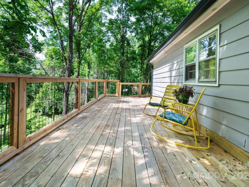 15 Yvonne Lane, Asheville, NC 28803.  MLS# CAR4198870, YatesRealty ID 3456. Expansive Back Deck for Lazy Days