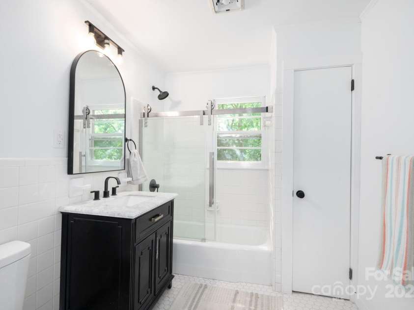 15 Yvonne Lane, Asheville, NC 28803.  MLS# CAR4198870, YatesRealty ID 3456. Second Full Bathroom with Antique-Style Vanity
