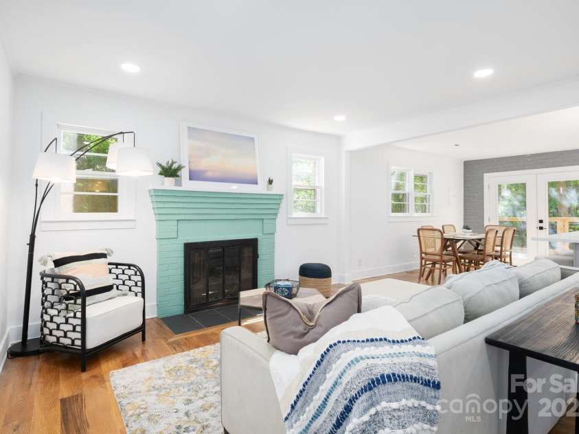 15 Yvonne Lane, Asheville, NC 28803.  MLS# CAR4198870, YatesRealty ID 3456. Wood-Burning Fireplace with Brick Surround