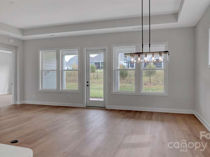 3023 Lake Como Drive, Monroe, NC 28110.  MLS# CAR4281950, YatesRealty ID 3456. Great Room with casual dining area 