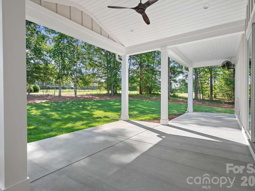 126 Manorly Lane, Mooresville, NC 28115.  MLS# CAR4391858, YatesRealty ID 34565. Large back Patio