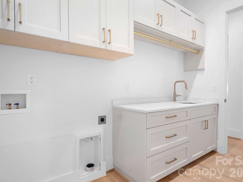 126 Manorly Lane, Mooresville, NC 28115.  MLS# CAR4391858, YatesRealty ID 34565. Laundry connected to Primary Suite