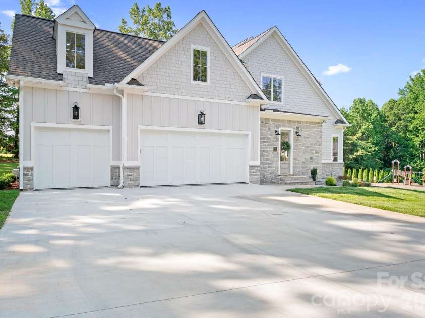 126 Manorly Lane, Mooresville, NC 28115.  MLS# CAR4391858, YatesRealty ID 34565. Oversized garage